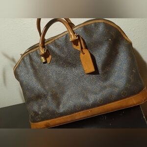 Louis Vuitton Luggage carry on bag